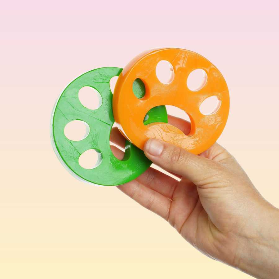 THE GROOMI: FURRI Laundry Fur Remover — reusable pet hair remover for laundry, washer/dryer safe, removes fur, hair, lint, dander; non-toxic, hypoallergenic; two-pack; 100+ uses; keeps clothes and bedding fur-free. 